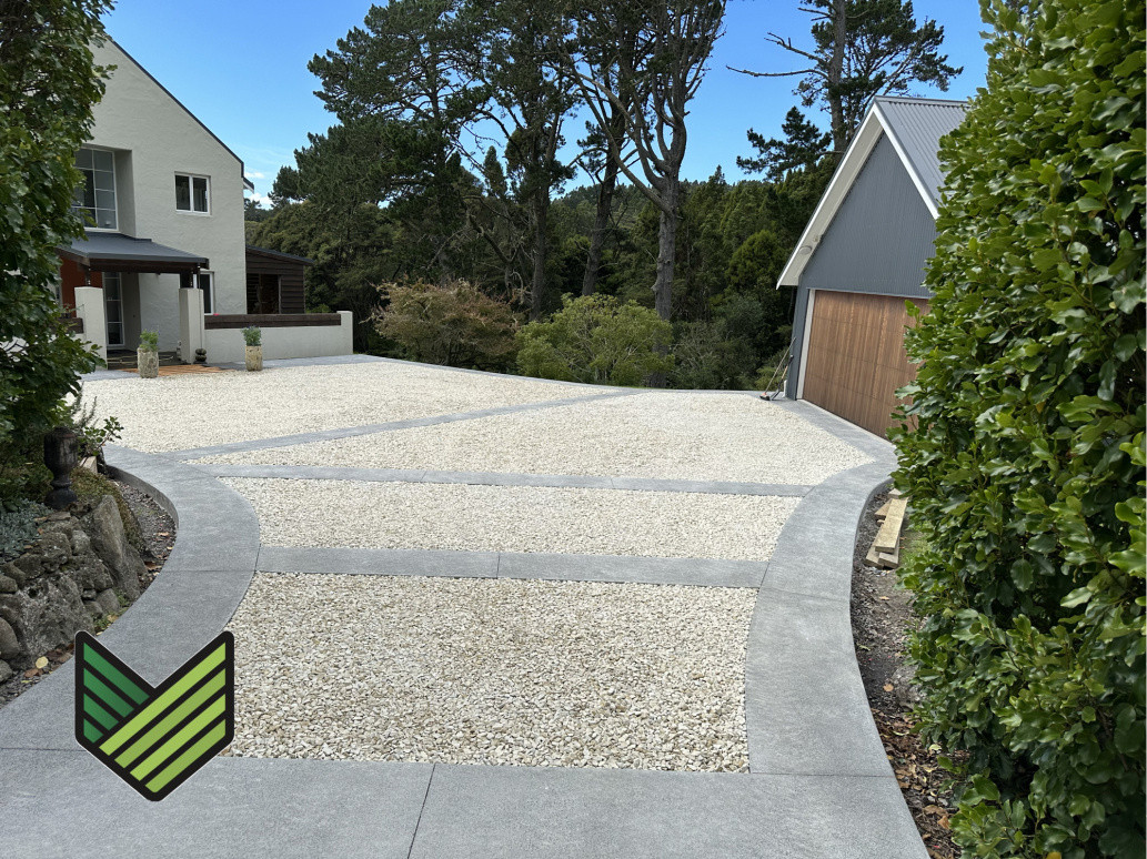 Concrete and white chip permeable driveway.