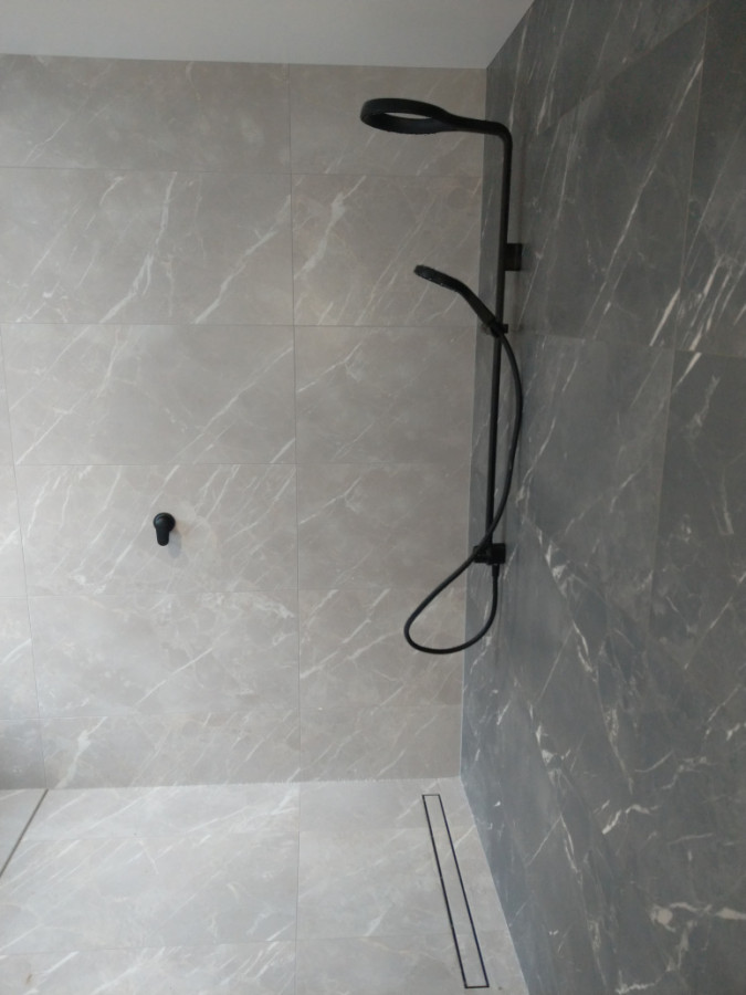nice big tiled shower reno