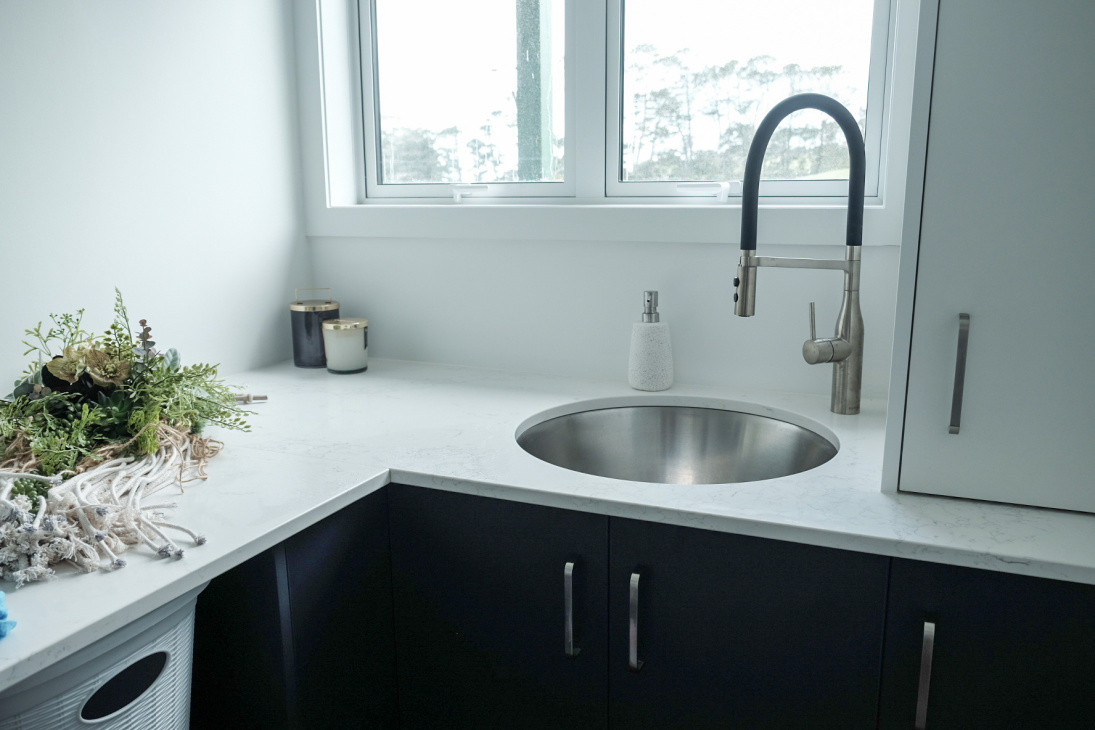Laundry renovation with custom sink & pullout mixer tap