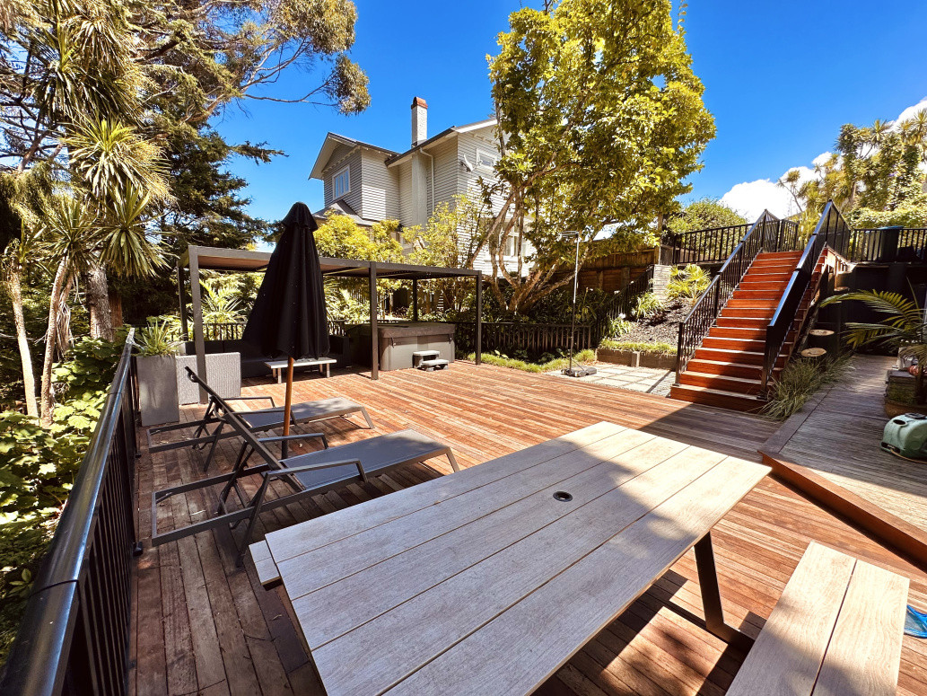 Transformed this steep unusable backyard on a Remuera property into an inviting social area. We excavated, built retaining walls, created a new car parking area, staircase down onto a huge 70 square meter deck, 130 metre balustrade, and a louvre pergola.