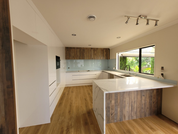 Premium Quartz waterfall benchtop & Acrylic fronts