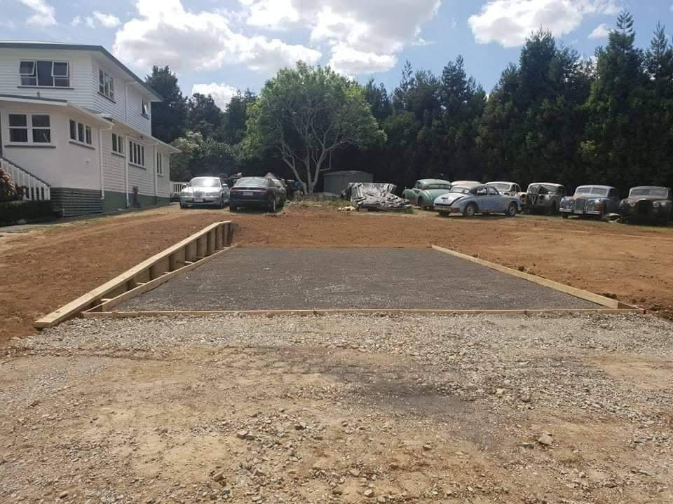 Small shed cut and retaining wall