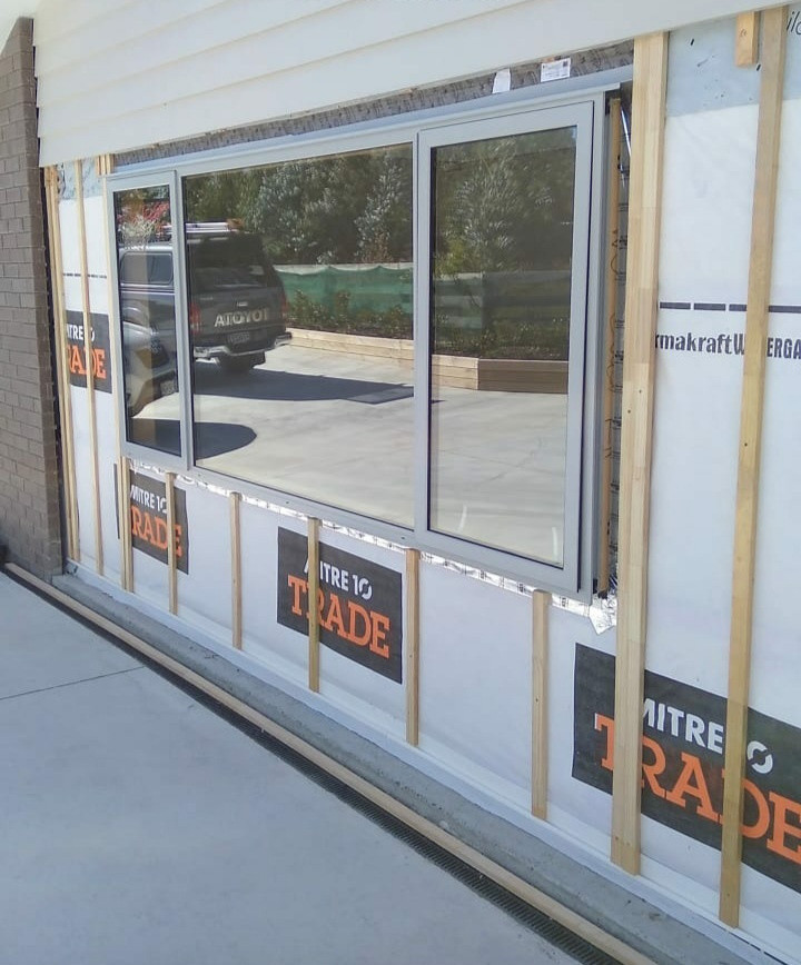 Double garage door removed.  Conversion