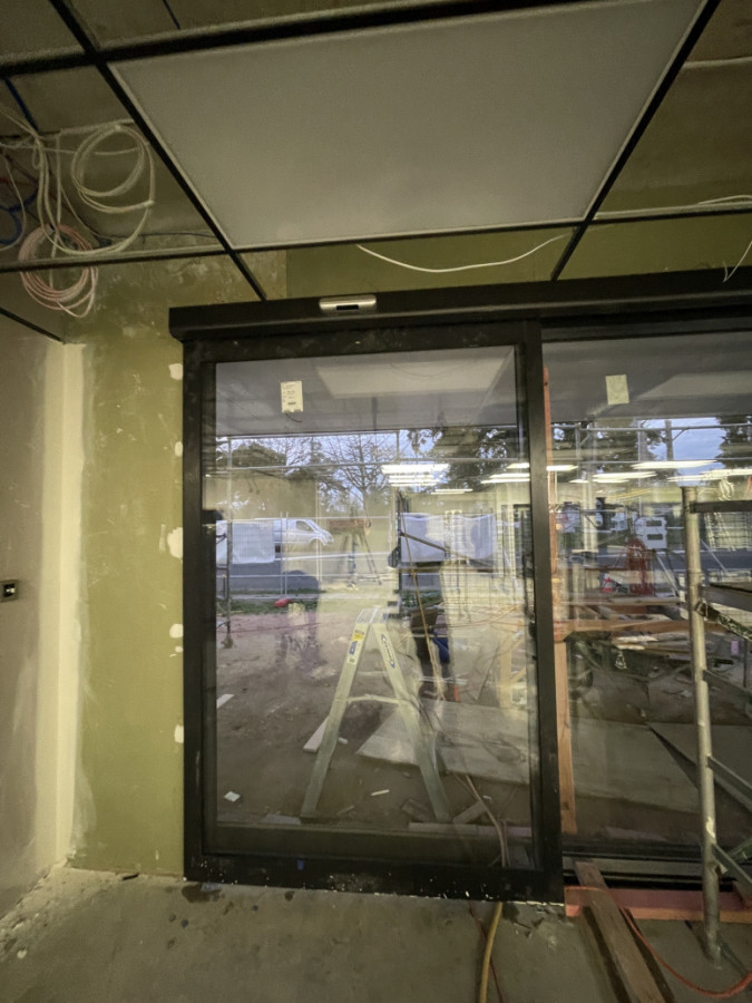 Supply and install automatic shop doors, fully IQP registered.