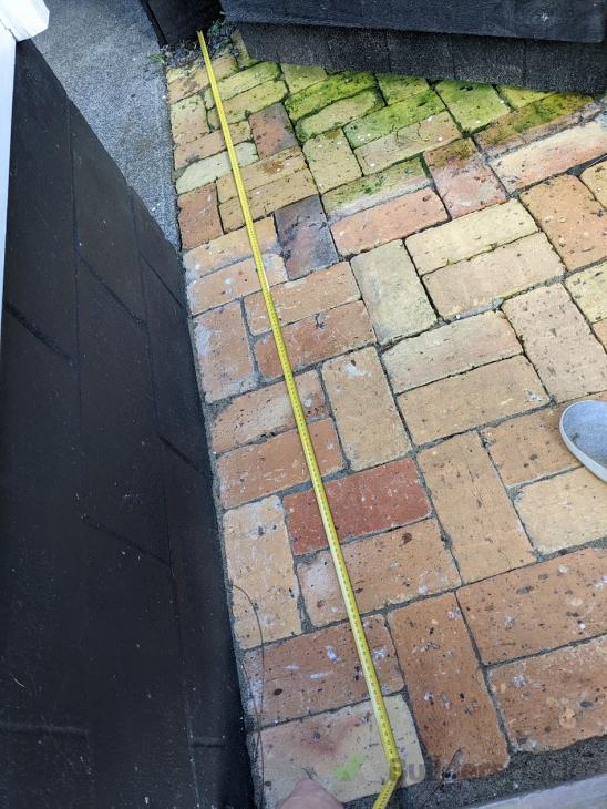 Remove brick pavers then relay them once power has been put underneath