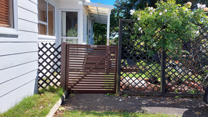 Pagola and fence gate painted