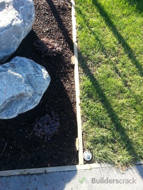 Basic lawn edging and raised vege garden beds ( 137077) Builderscrack