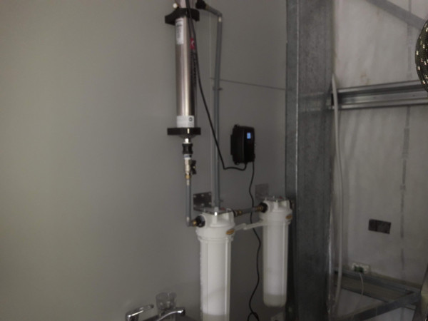 Filter system off harvest tank water