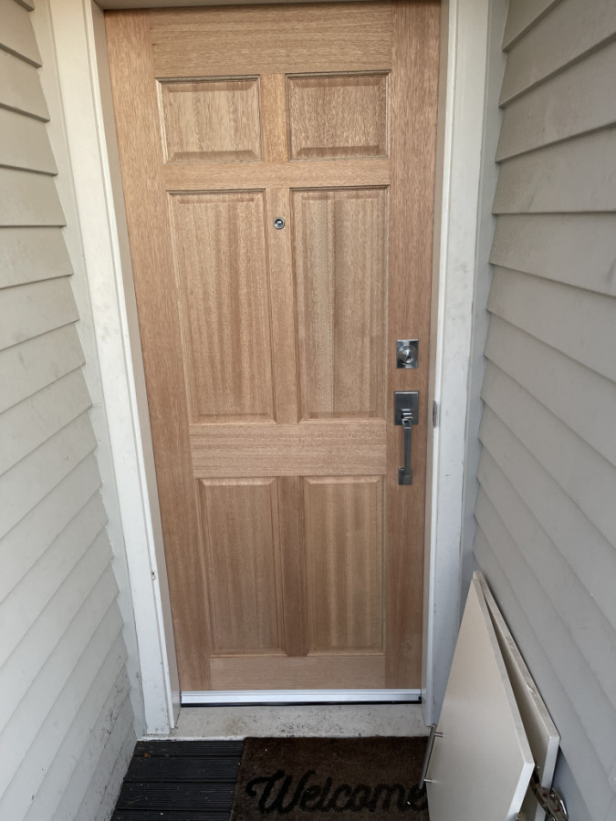 Exterior door with new hardware