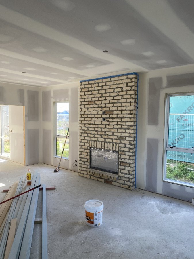 Negative Detailing around Fireplace. Squarestop Blending in perfectly.