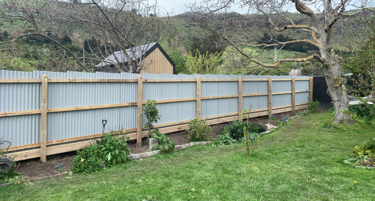 Affordable iron fencing with retaining bellow. Side boundary max hight 2M gain extra privacy.