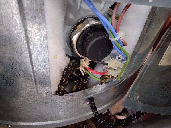 Asbestos containing wiring on the Hot Water Cylinder