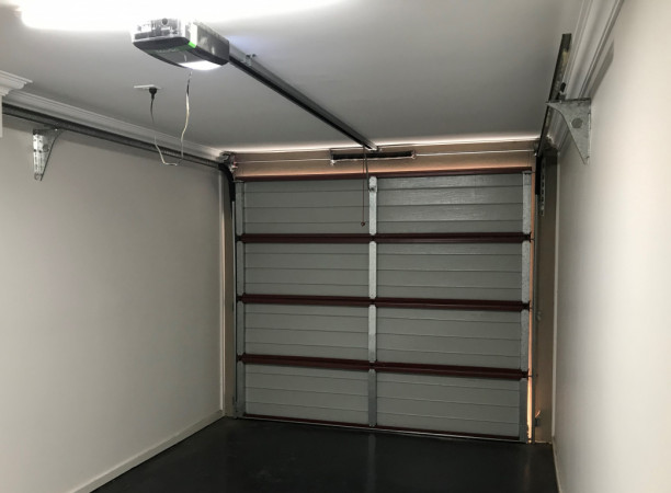 Brand new single garage door and Merlin automatic opener installed on Saturday morning.