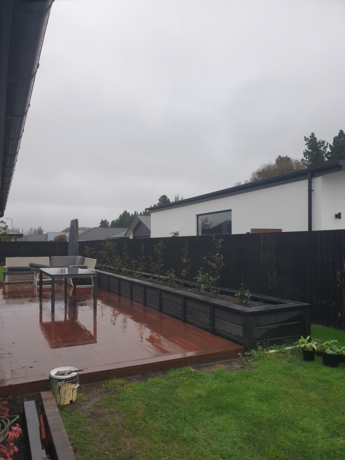 Deck Sanded,stained and new timber planterbox