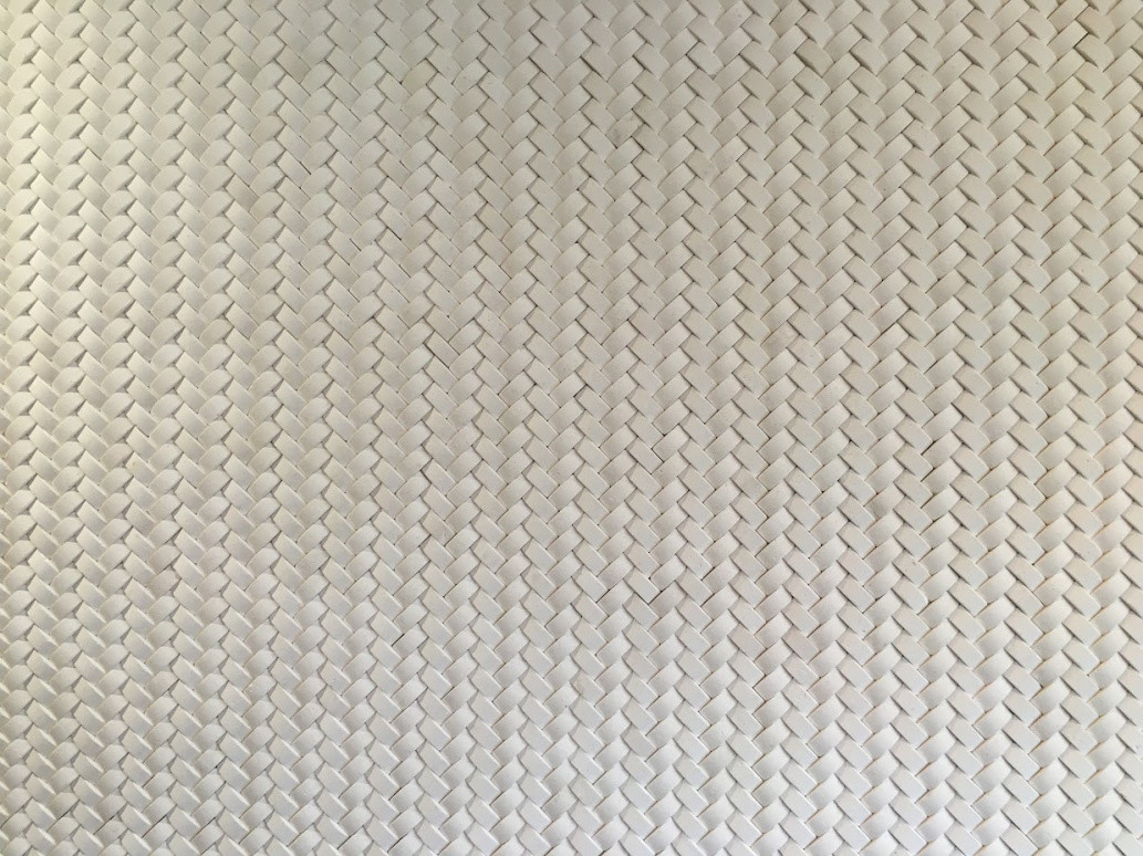Herringbone soft white stone fireplace
