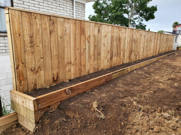 Manukau -Fence with retaining wall and planter edging