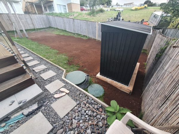 Excavation with new scoria and topsoil