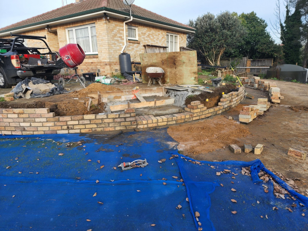 brick work taking shape for formal lawn area