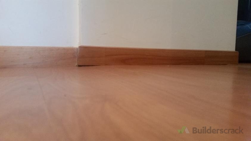 Uneven And Bulging Laminate And Tile Flooring 140349