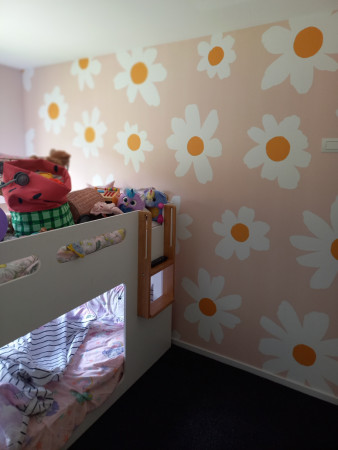 pink walls and flower mural