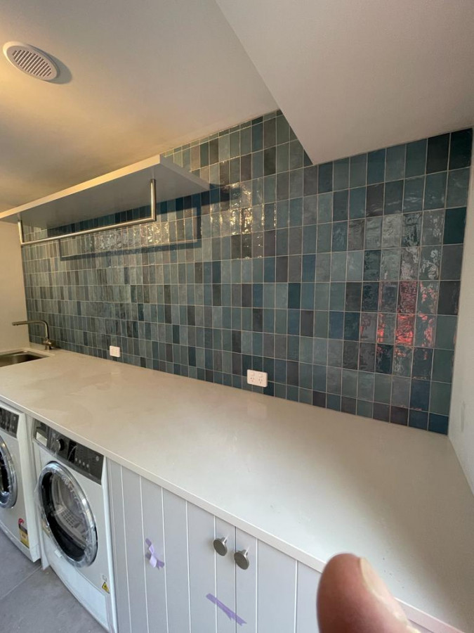 Laundry splash back