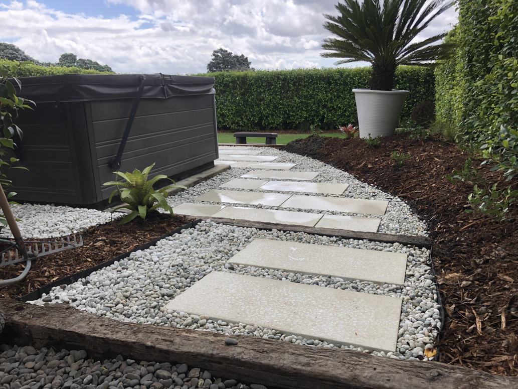 Completed paving and landscaping around our spa pool pad (After photo)