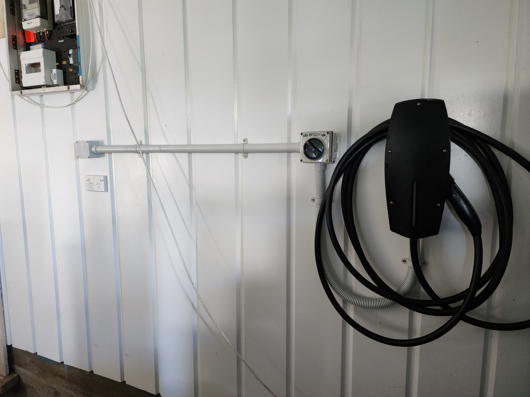 Relocated this Tesla EV charger unit