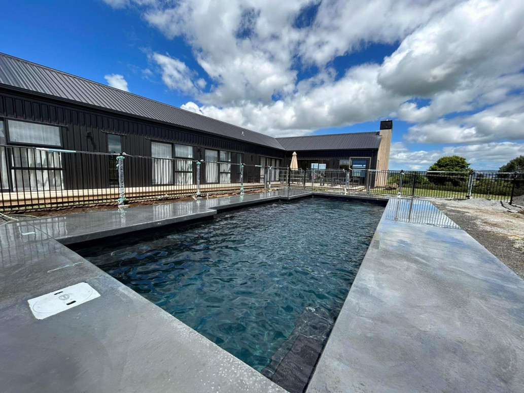 ½ Black concrete pool overhang