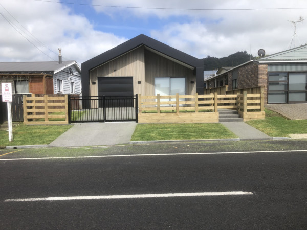 Farm style fence with black gates