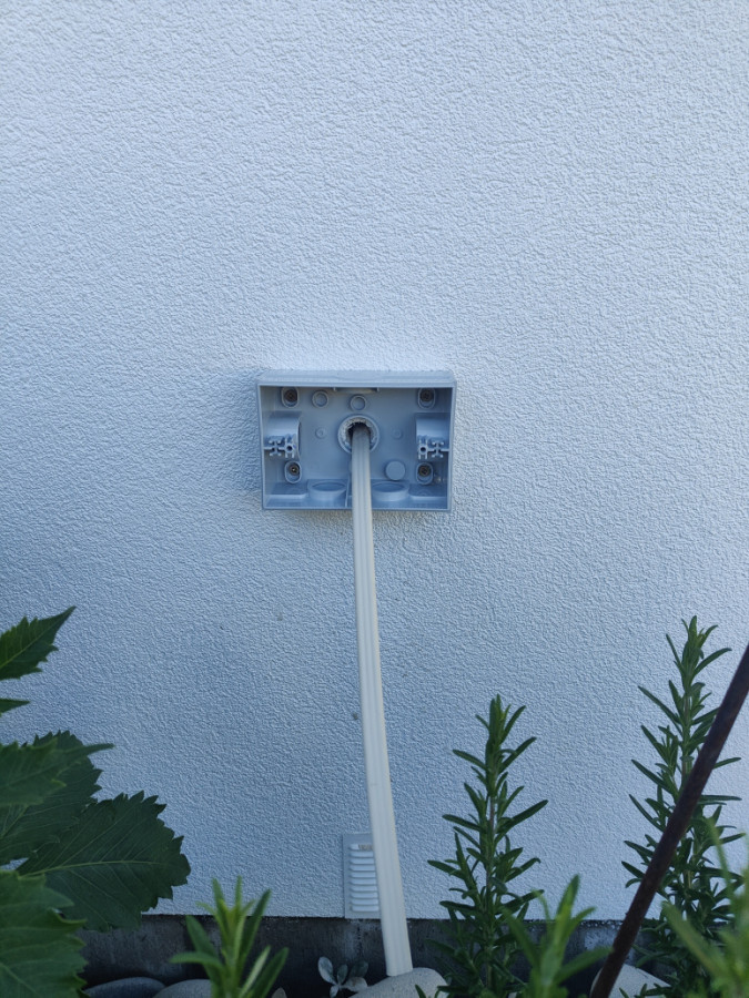 Base mounted on wall