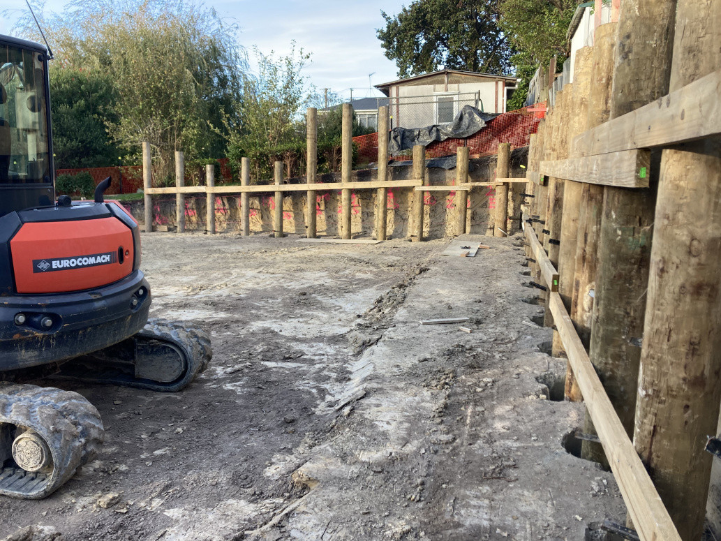 Site cut, earthmoving, retaining walls, slab prep, services and driveway prep