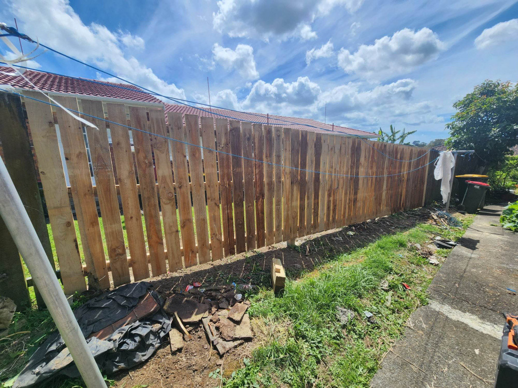 This was a damage fence which I removed and replaced with a new paling fence