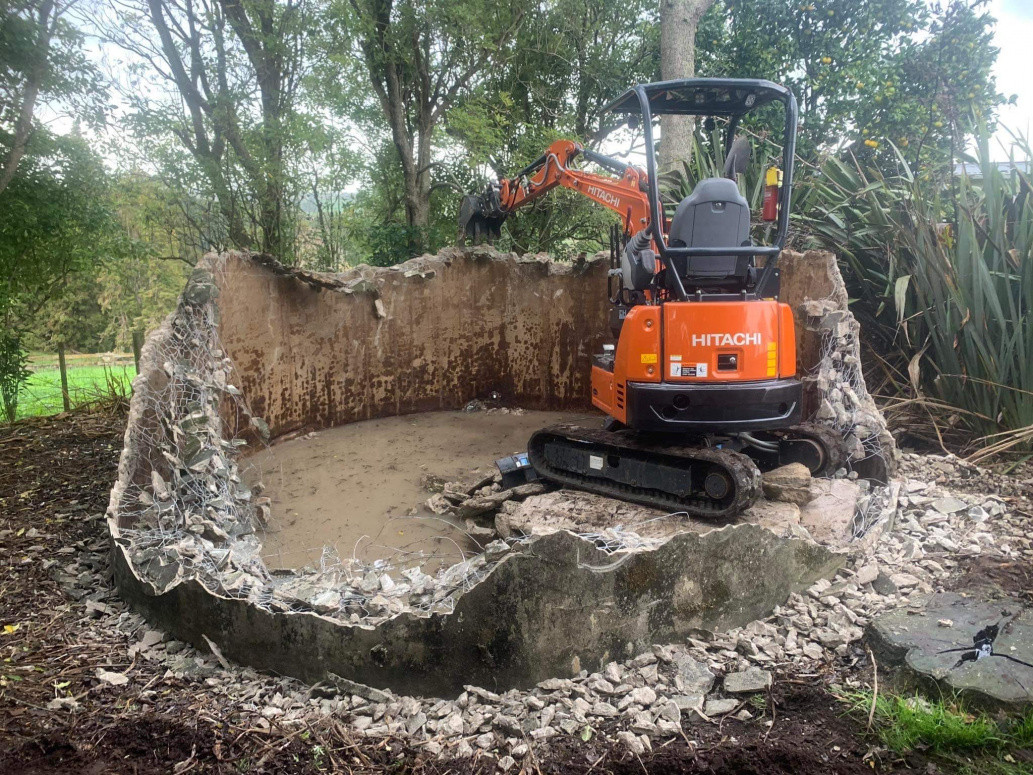 Demo of concrete tank