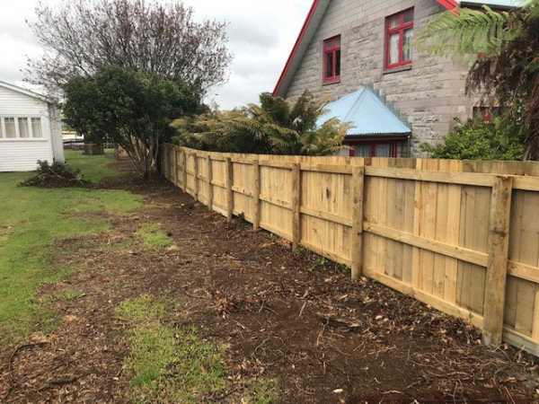 New paling fence on cleared boundary