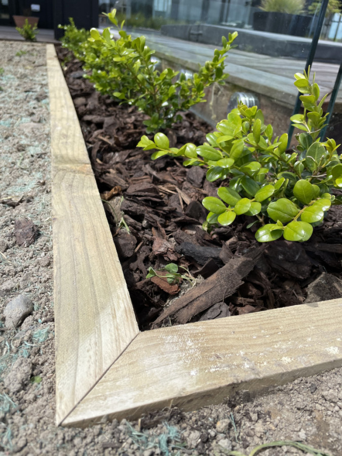 Timber garden edging/ mowing strip