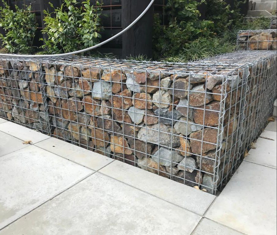 Gabion wall with 600x600 concrete pavers, star jasmine climbing