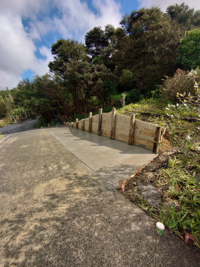 New carports and retaining wall
