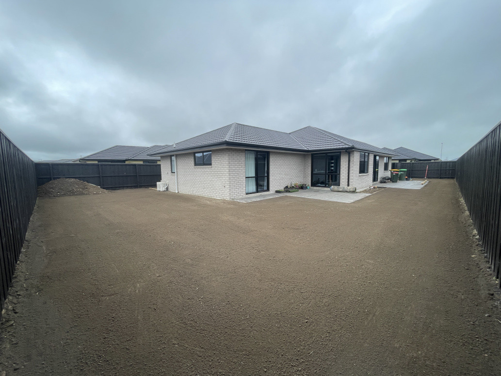 Screened topsoil layed at 100mm. Planter boxes to be installed around fence line after grass strikes.