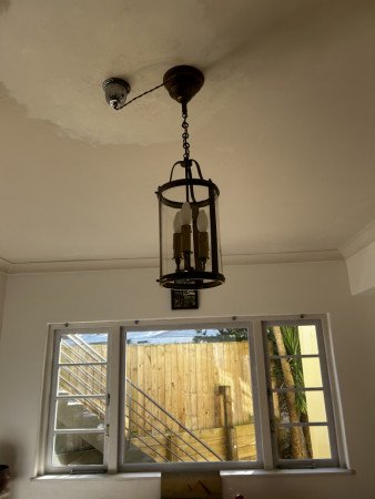 1920 light, installed to a 1941 concrete ceiling, very delicate work.