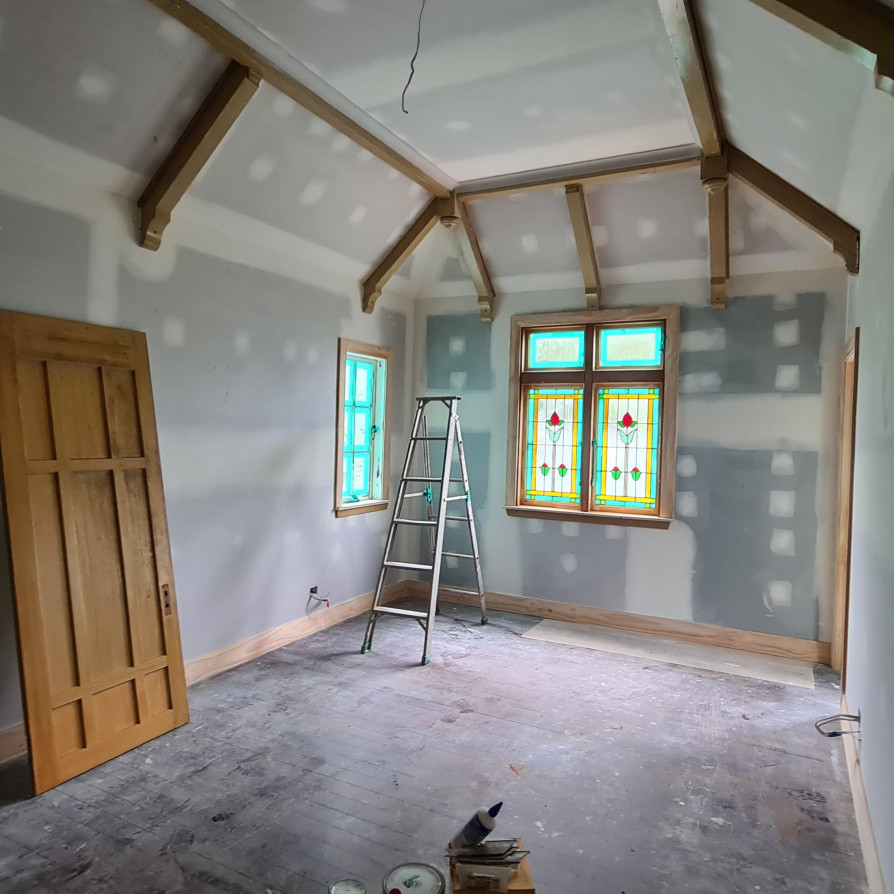 Love these beautiful  stained window , we masked up all windows and Sprayed doors
