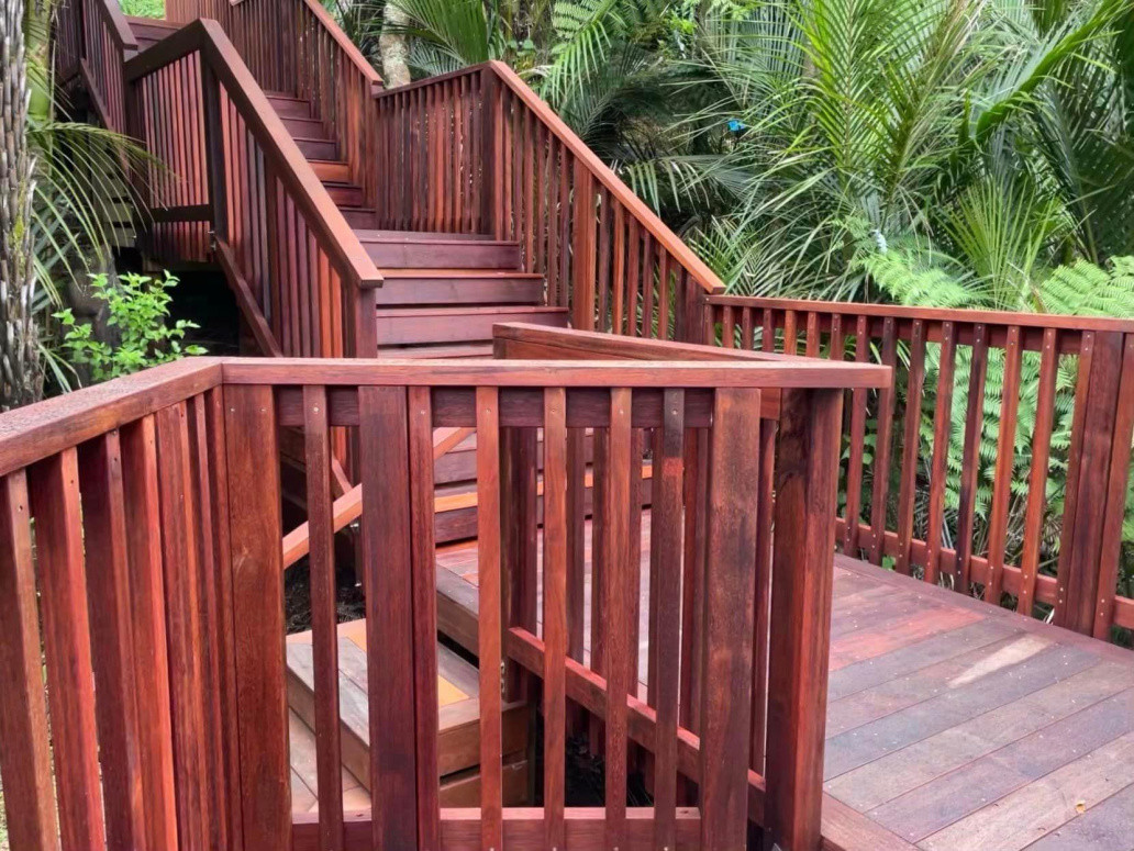 Kwila decking, 4 sets of kwila stairs, kwila balustrades and handrail, internal flooring, insulated, new front door, new roofing. Langholm