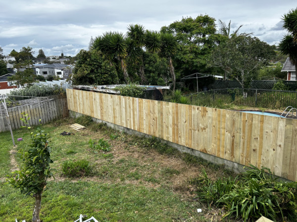 Gave this 30 year old fence a brand new look with a footing in the old and a wall in the new! 💯% satisfaction.