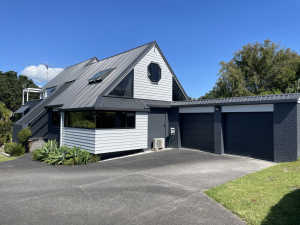 Reroof with long run sheeting