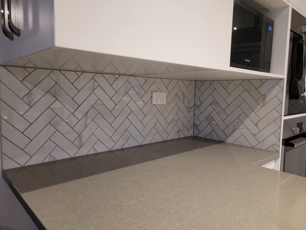 Herringbone pattern mosaic tiling