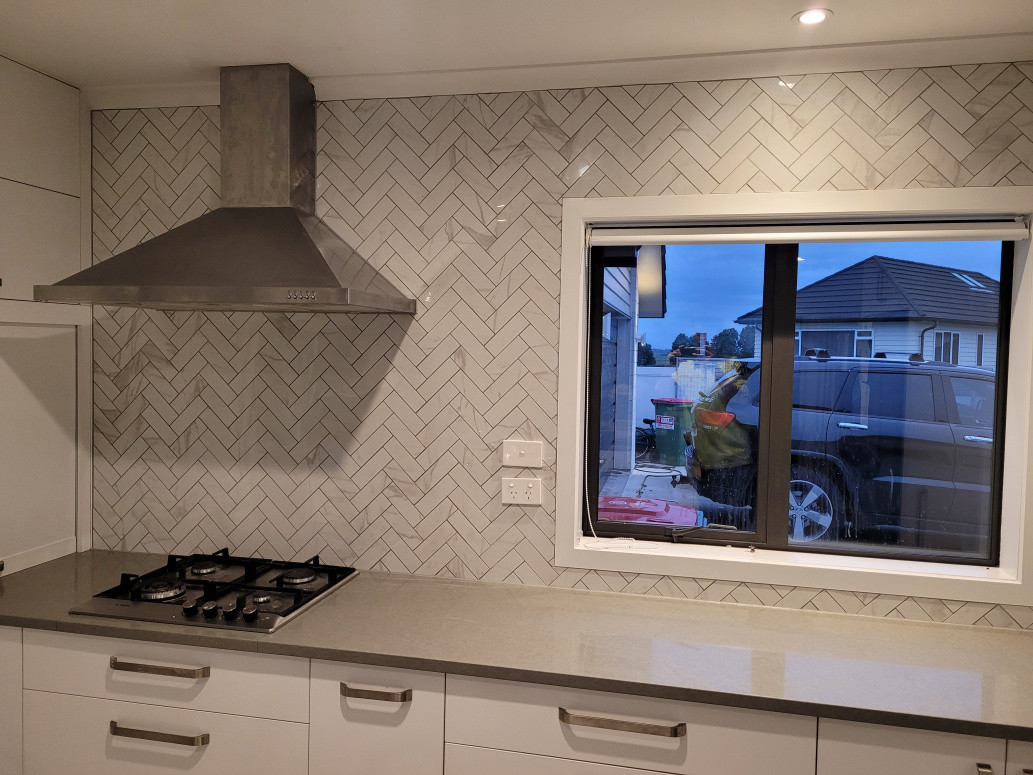 Whole wrapped by herringbone tiles