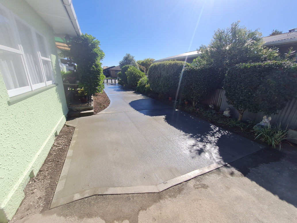 Brush finish driveway upgrade Builderscrack