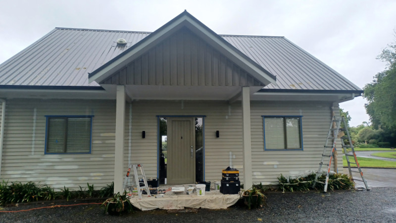 The stages of repainting a weatherboard cottage. Prepping f the surface for a sound finish, filling, priming, removing of the rot and treating correctly, working the rust and galvanizing the flashing, taking care of the joinery for that crisp finish