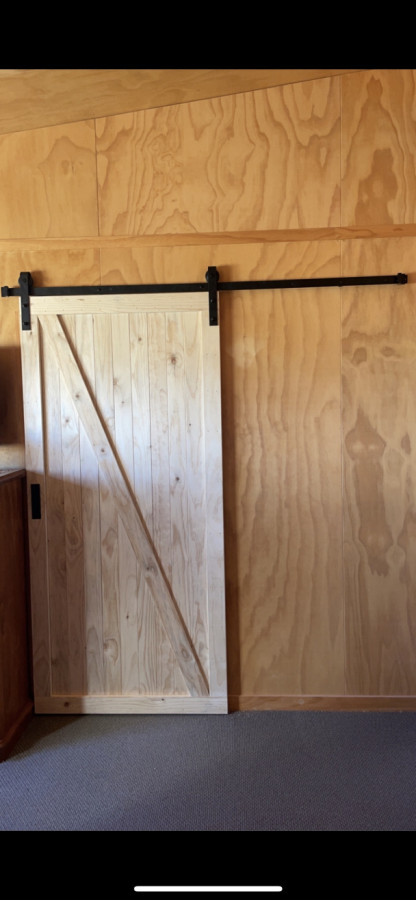 External barn sliding door built and installed for a client