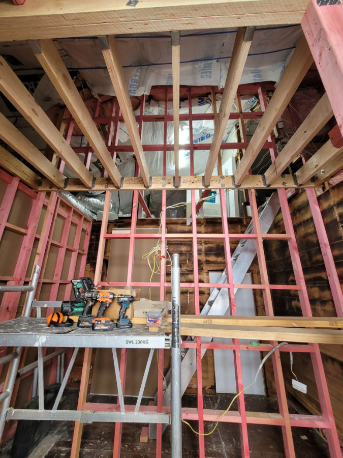 New wall ,high stud ,joist for extra storage.