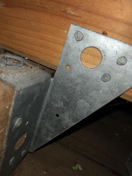 Installing extra beam in attic to support plywood attic flooring